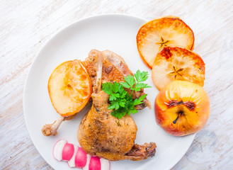 Roasted duck leg with baked apples