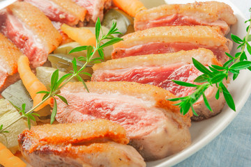 Baked duck breast with zucchini and carrots