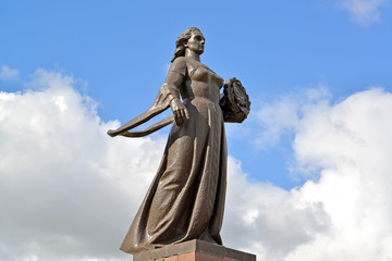 Monument "Mother Russia" against the sky in Kaliningrad