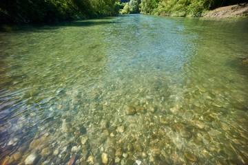 Lake with blue mountains and sky