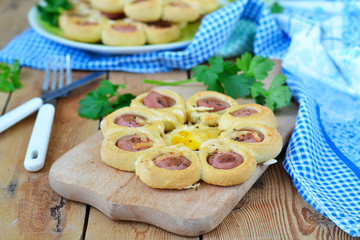 Buns with sausage, cheese and eggs