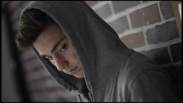 Teennager Boy in hooded top