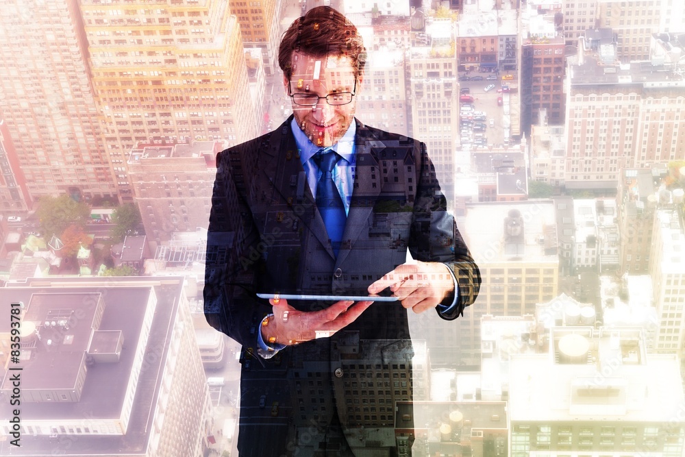 Poster Composite image of businessman standing while using a tablet pc
