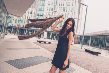 Beautiful girl posing in an urban context