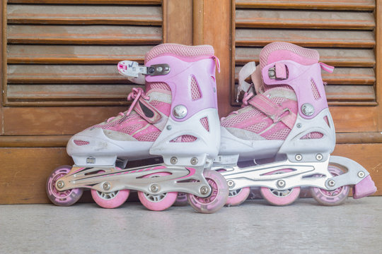 old pink roller skate