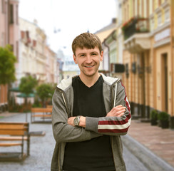 portrait of a trendy young man in the city