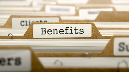 Benefits Concept with Word on Folder.