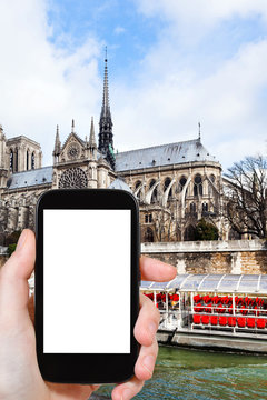tourist photographs cathedral Notre Dame de Paris