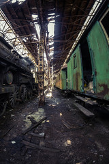 Fototapeta na wymiar Old trains at abandoned train depot
