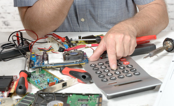 a technician repairing a computer