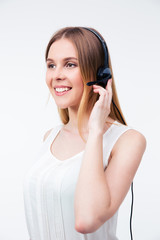 Naklejka premium Happy young female operator in headset