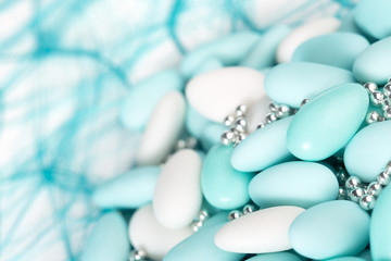 heap of azure and white sugared almonds