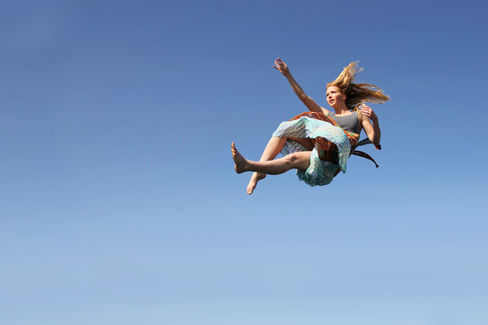 Woman Falling Through the Sky Stock Photo | Adobe Stock