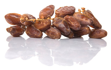 Date fruits over white background