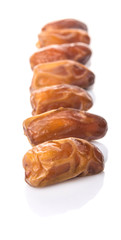 Date fruits over white background