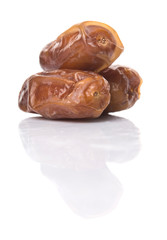 Date fruits over white background
