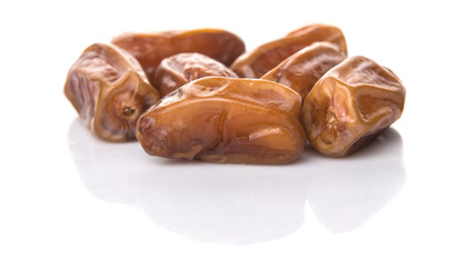 Date fruits over white background
