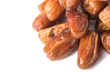 Date fruits over white background