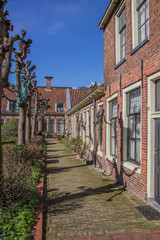 Fototapeta na wymiar Old houses of the Pepergasthuis in Groningen