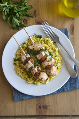 Chicken and chorizo kebabs with rice
