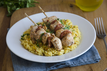 Chicken and chorizo kebabs with rice