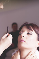 Obraz premium Bridal make up with groom behind