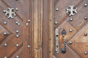Exterior of the old wooden door in Vilnius, Lithuania.