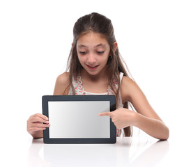 Beautiful pre-teen girl showing a tablet computer. 