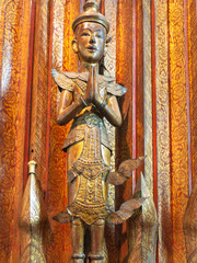 nice artwork of praying guardian angel in temple