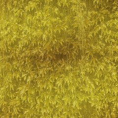 Relief embossed summer background with ivy leaves