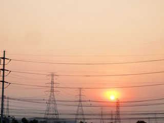 high voltage post.High-voltage tower and sunset