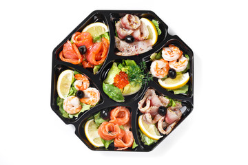 top view of buffet box catering with fish and seafood