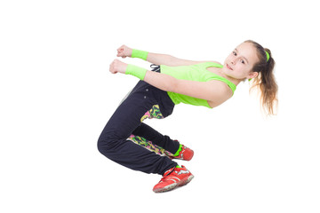 Happy little girl dancing hip-hop isolated on white background