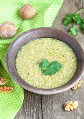 Traditional soup kharcho of beef broth with walnuts, cilantro