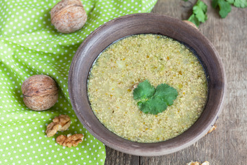 Traditional soup kharcho of beef broth with walnuts, cilantro