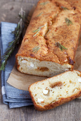 Savory loaf cake with parmesan cheese, feta cheese, figs 