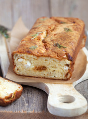 Savory loaf cake with parmesan cheese, feta cheese, figs 