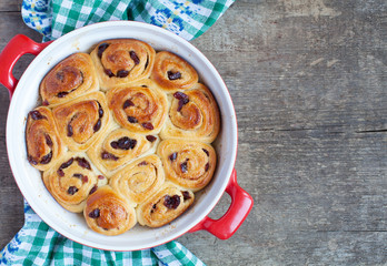 Traditional English buns Chelsea with dried cranberries 