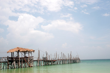 Traditional wooden bridge on the beach.