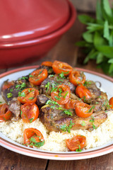 Moroccan tagine with lamb, tomatoes and couscous