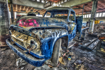 Abandoned old blue truck