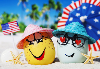 Happy eggs on ocean beach during patriotic holiday