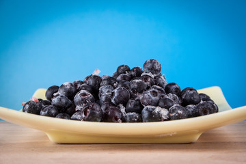 blueberries on a wooden table