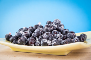 blueberries on a wooden table
