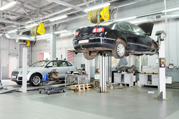 Cars in a dealer repair station in Moscow, Russia - obrazy, fototapety, plakaty