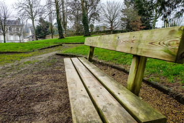 Fototapeta premium wood bench in public park