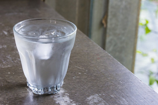 Water glass with some ice