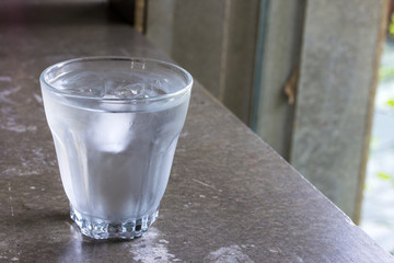 Water glass with some ice