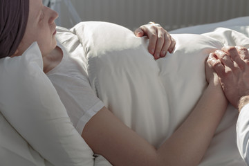 Obraz na płótnie Canvas Cancer woman lying in hospital bed
