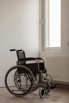 Wheelchair in empty room